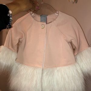 Plush pink jacket with faux fur sleeves and bottom